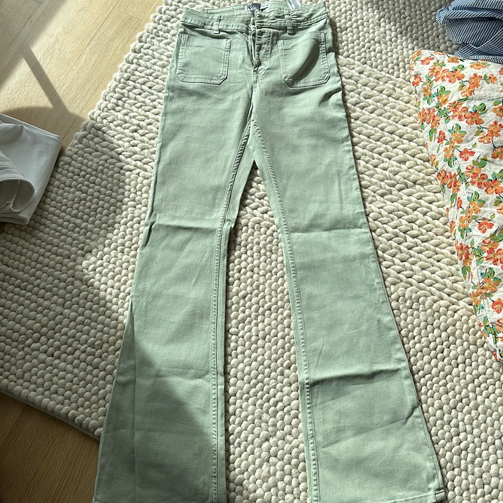 Celadon flare jeans never worn